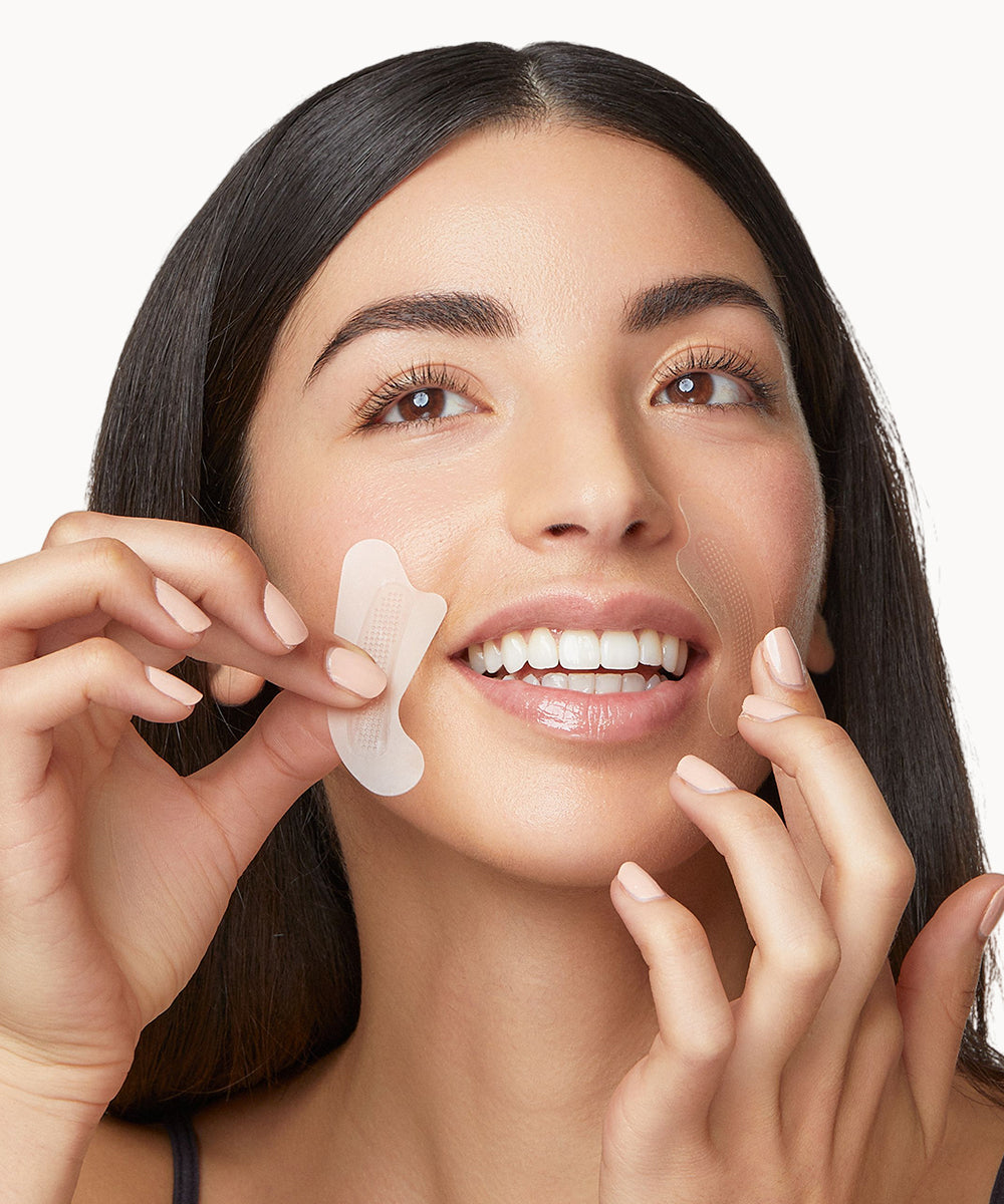 Revive skin patch applied on woman's face